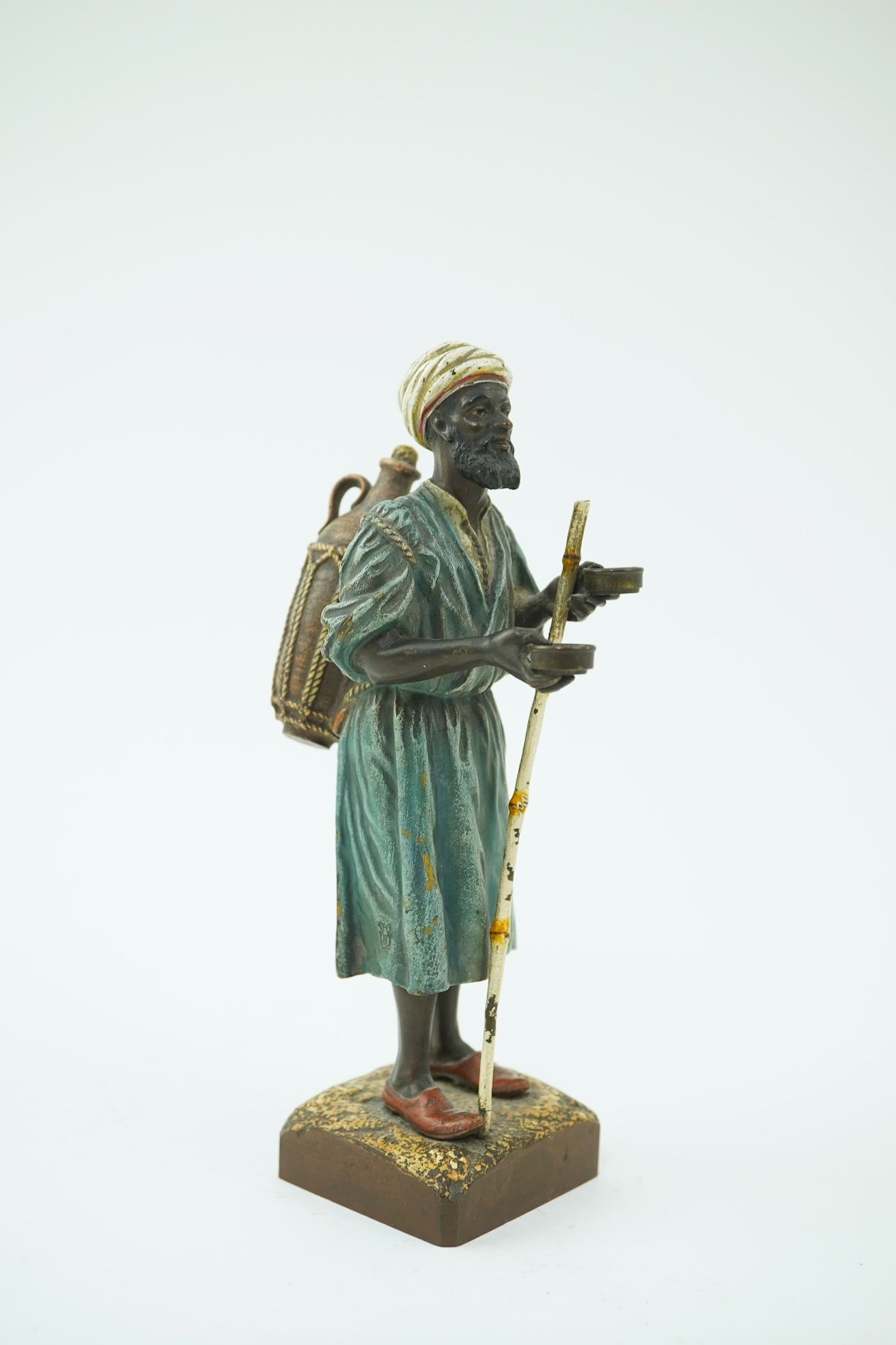 Franz Xavier Bergman (Austrian, 1861-1936). A Viennese cold painted bronze figure of a North African street vendor